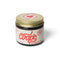 Jar of Coop's product with a gold lid on a white background