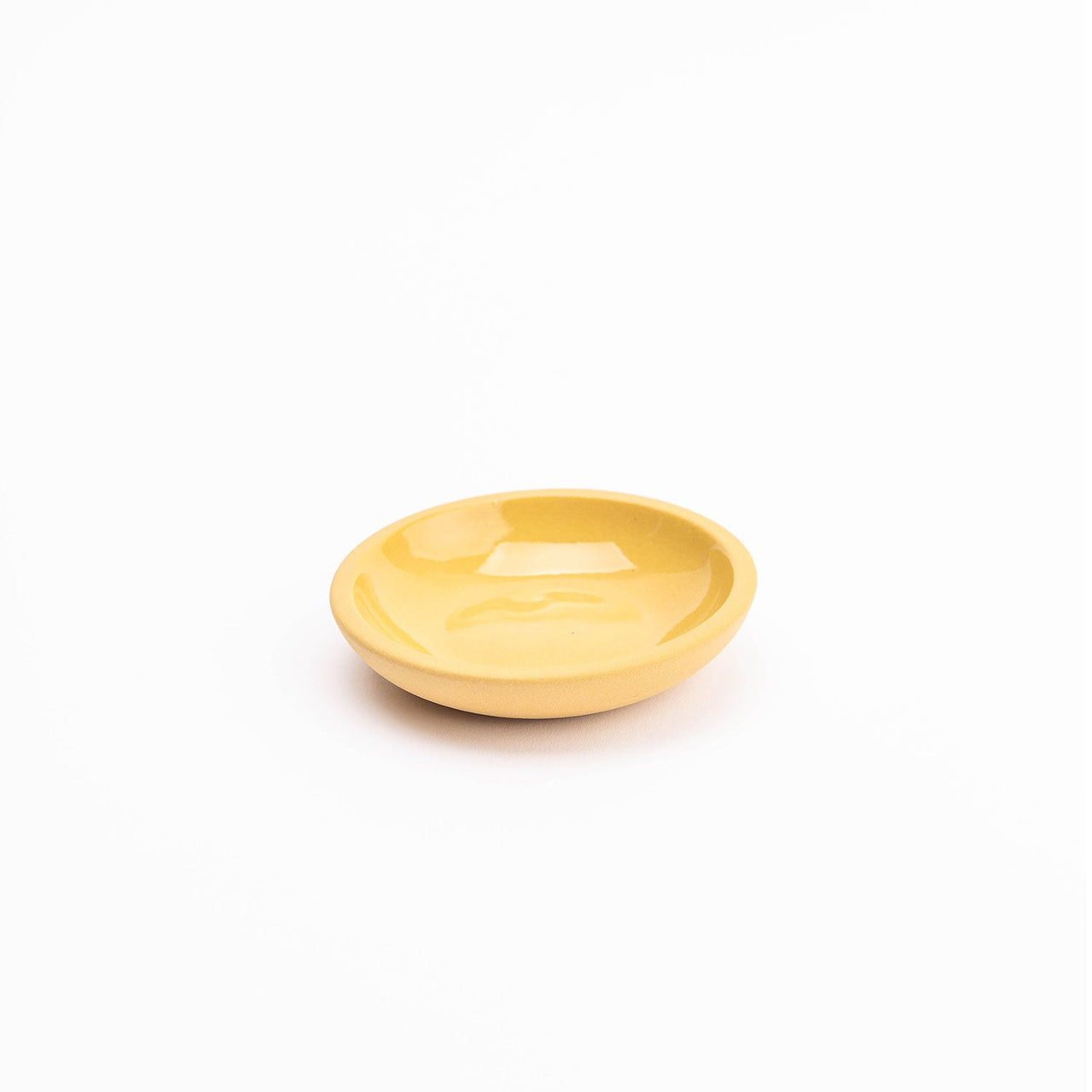 small yellow ceramic dish