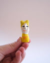 Assorted Little Ladies hand-sculpted ceramic figures by Lili Todd