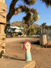 Assorted Little Ladies hand-sculpted ceramic figures by Lili Todd