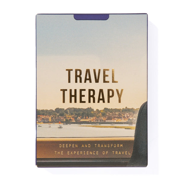 Product packaging with 'Travel Therapy' text and a scenic image on a white background