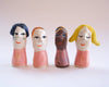 Assorted Little Ladies hand-sculpted ceramic figures by Lili Todd