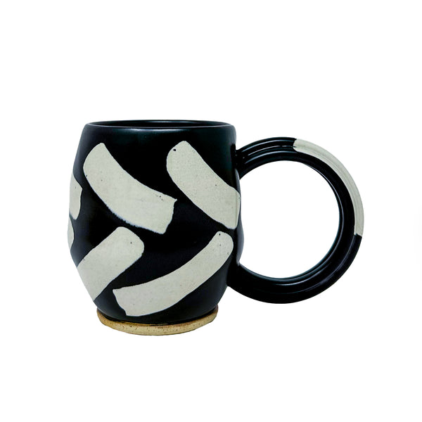 Black Mug with Eggshell Shapes