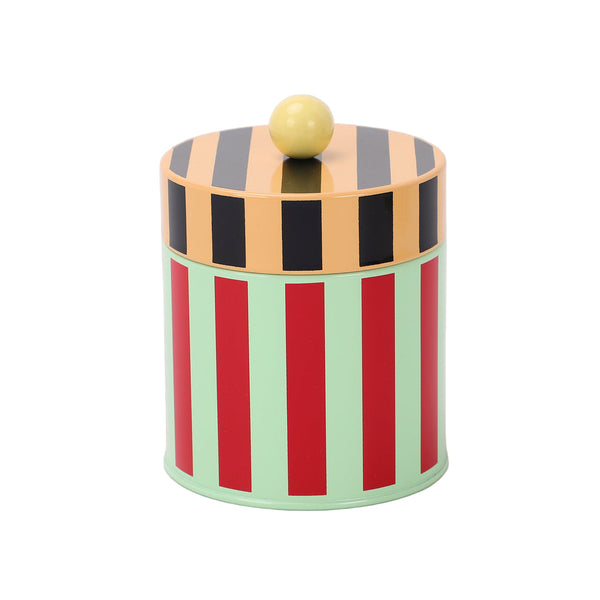 Colorful striped cylindrical container with a yellow knob on a beige background