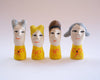 Assorted Little Ladies hand-sculpted ceramic figures by Lili Todd