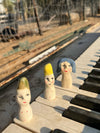 Assorted Little Ladies hand-sculpted ceramic figures by Lili Todd