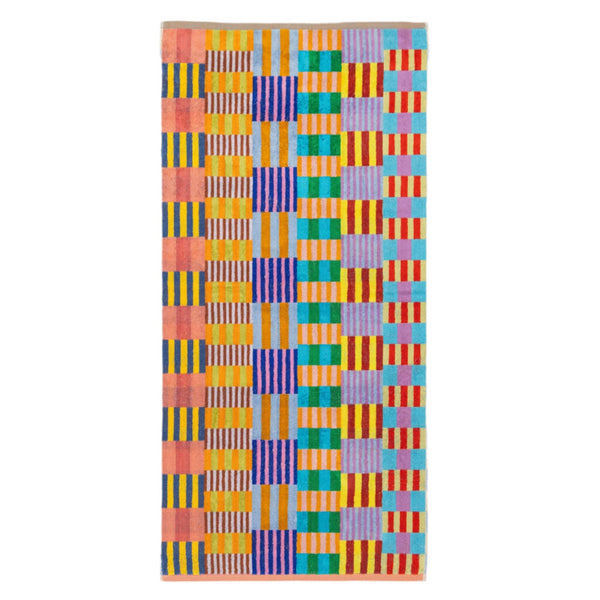 Colorful geometric patterned towel on a white background